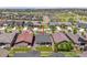 An aerial shot showcases the home's location within a well-planned community at 22656 E Glidden Dr, Aurora, CO 80016