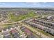 Aerial photo of a neighborhood featuring the home's proximity to parks and green spaces at 22656 E Glidden Dr, Aurora, CO 80016