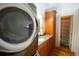 Bathroom vanity featuring gray granite countertop, wood cabinets and mirrored medicine cabinet at 2261 Blake St # 5H, Denver, CO 80205