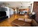 Open-concept living space with a modern kitchen and comfortable seating area at 2261 Blake St # 5H, Denver, CO 80205