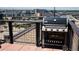 Rooftop patio with a Weber grill perfect for outdoor entertaining and enjoying the city's open spaces at 2261 Blake St # 5H, Denver, CO 80205