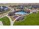 A luxurious pool and playground provides a relaxing and enjoyable gathering space for the community at 18926 W 94Th Ave, Arvada, CO 80007