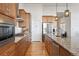 Stylish kitchen featuring granite countertops, stainless steel appliances, and custom cabinetry at 18926 W 94Th Ave, Arvada, CO 80007