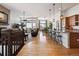 Open concept living space with hardwood floors, abundant natural light, and modern finishes at 18926 W 94Th Ave, Arvada, CO 80007