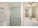 Bathroom featuring a glass enclosed shower and modern fixtures at 90 Ammons St, Lakewood, CO 80226