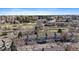 A beautiful aerial view of townhomes with lush green trees and blue skies in the background at 1818 S Quebec Way # B15-5, Denver, CO 80231