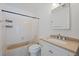 Bathroom with shower and tub combination and tile surround at 1818 S Quebec Way # B15-5, Denver, CO 80231