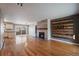 Inviting living room featuring a modern fireplace and wood floors, creating a warm, stylish atmosphere at 1818 S Quebec Way # B15-5, Denver, CO 80231