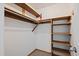 Walk-in closet with shelving and carpet at 1818 S Quebec Way # B15-5, Denver, CO 80231