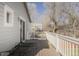 Outdoor deck with wooden floorboards and white railings, offering plenty of space for outdoor enjoyment at 1835 Columbine Ave, Boulder, CO 80302