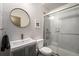Modern bathroom featuring a glass-enclosed shower, a vessel sink, and sleek finishes for a contemporary feel at 2103 W 32Nd Ave # 10, Denver, CO 80211