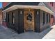 Charming building exterior with decorative door and classic brickwork at 2103 W 32Nd Ave # 10, Denver, CO 80211