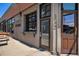 Street view of a restaurant with modern architecture and outdoor seating area at 2103 W 32Nd Ave # 10, Denver, CO 80211