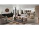 Open living room with modern furniture and a view of the contemporary kitchen at 2434 Mapleton Ave, Boulder, CO 80304