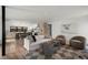 Bright living room featuring modern decor, hardwood floors, and open layout to kitchen at 2434 Mapleton Ave, Boulder, CO 80304