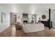 Cozy living room showcasing hardwood floors, a fireplace, and stylish furniture, creating a warm and inviting atmosphere at 2434 Mapleton Ave, Boulder, CO 80304