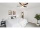 Bedroom features art, closet and access to other rooms at 2393 E 90Th Ave, Thornton, CO 80229