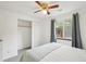 Sunlit bedroom features a ceiling fan and view to the exterior at 2393 E 90Th Ave, Thornton, CO 80229