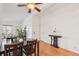 Dining area offers hardwood floors and ceiling fan plus stylish table, chairs, and decor at 2393 E 90Th Ave, Thornton, CO 80229