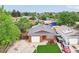 Aerial view of a one story home with a lush front lawn and a convenient one-car attached garage at 2393 E 90Th Ave, Thornton, CO 80229