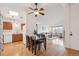 Open living space combines dining area, modern kitchen, and comfortable seating for easy living at 2393 E 90Th Ave, Thornton, CO 80229