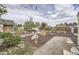 Backyard featuring custom landscaping elements, including decorative statues and stone accents at 1254 S Osceola St, Denver, CO 80219