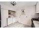 Kitchen area with appliances, washer, dryer and back door at 1254 S Osceola St, Denver, CO 80219