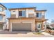 Inviting two-story home featuring a neutral color palette and attached two car garage at 18639 E 50Th Pl, Denver, CO 80249