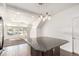 Kitchen island with granite countertop and pendant lighting at 18639 E 50Th Pl, Denver, CO 80249