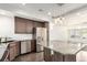 Kitchen with stainless appliances, granite countertops, and tile backsplash at 18639 E 50Th Pl, Denver, CO 80249