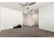 Spacious living room with neutral carpet, recessed lighting, and ample space at 18639 E 50Th Pl, Denver, CO 80249