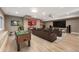 Finished basement with home theater and foosball table at 3880 Sheridan Blvd, Denver, CO 80212