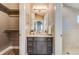 Modern bathroom with granite vanity and shower at 3880 Sheridan Blvd, Denver, CO 80212