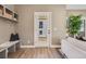 Bright entryway with built-in bench, offering ample storage at 3880 Sheridan Blvd, Denver, CO 80212