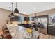 Modern kitchen with granite countertops and stainless steel appliances at 3880 Sheridan Blvd, Denver, CO 80212