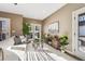 Open living area with natural light and access to outdoor space at 3880 Sheridan Blvd, Denver, CO 80212