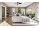 Sunlit living room featuring a comfortable sofa and stylish decor at 3880 Sheridan Blvd, Denver, CO 80212