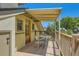 Lovely balcony with wood flooring and a small table and chairs at 4545 King St, Denver, CO 80211