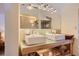 Bright bathroom features double sinks with chrome faucets, plenty of lighting and storage space at 4545 King St, Denver, CO 80211