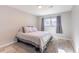 Cozy bedroom featuring a double bed and light grey walls at 5300 E Cherry Creek South Dr # 918, Denver, CO 80246