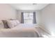 Well-lit bedroom with a double bed and window coverings at 5300 E Cherry Creek South Dr # 918, Denver, CO 80246