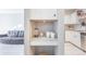 Kitchen nook with built-in shelving and coffee bar at 5300 E Cherry Creek South Dr # 918, Denver, CO 80246