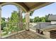 A cozy covered balcony shows a nice neighborhood view at 2077 S Clayton St, Denver, CO 80210