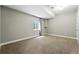 Bedroom with neutral walls, carpet, recessed lighting, and a window with natural light at 2077 S Clayton St, Denver, CO 80210