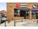 Jimmy John's with a brick facade and large windows in an urban setting at 2077 S Clayton St, Denver, CO 80210