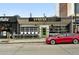 Modern building with a Serene Cuisine of India restaurant and black and white facade at 2077 S Clayton St, Denver, CO 80210