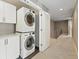 Laundry room featuring stacked washer and dryer at 2077 S Clayton St, Denver, CO 80210