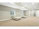 Spacious living room with neutral walls, carpet, recessed lighting and large sectional sofa at 2077 S Clayton St, Denver, CO 80210