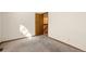 Bedroom showcasing neutral walls and carpet and a view of the stairway at 1816 S Pagosa Way # 5, Aurora, CO 80017