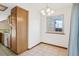 Cozy dining area with tile floors, chandelier, and a window offering natural light at 1816 S Pagosa Way # 5, Aurora, CO 80017